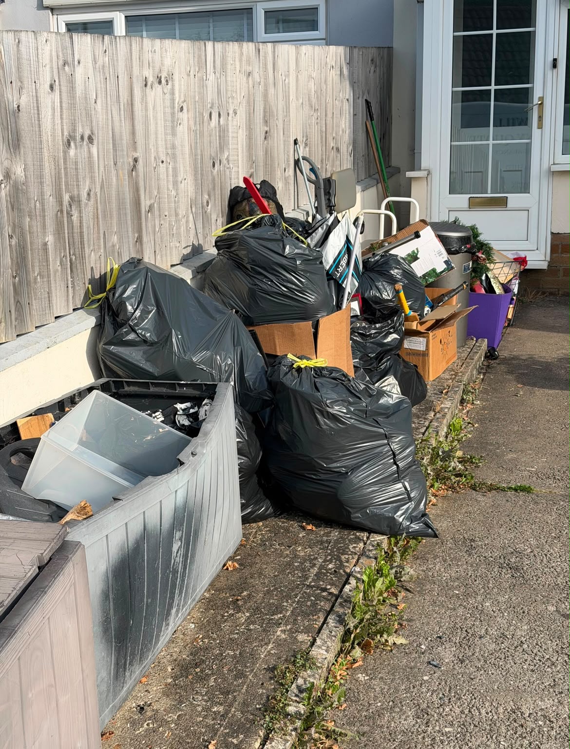 Outdoor clearance items before the Devon Heritage Removals team began
