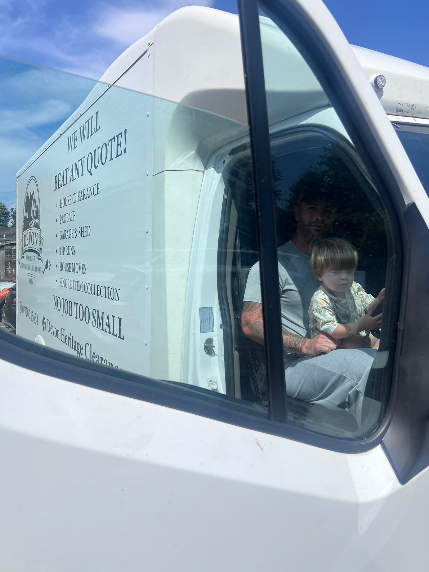 A Devon Heritage Removals team member sharing the van with the next generation